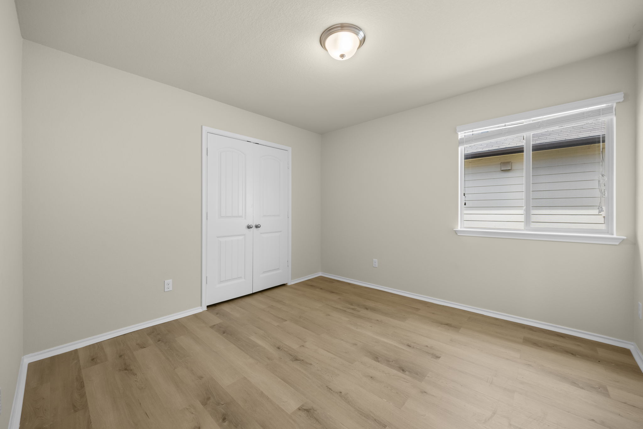 101 Plata Lane Jarrell, TX 76537 - Photo 10 of 27 an empty room with a window