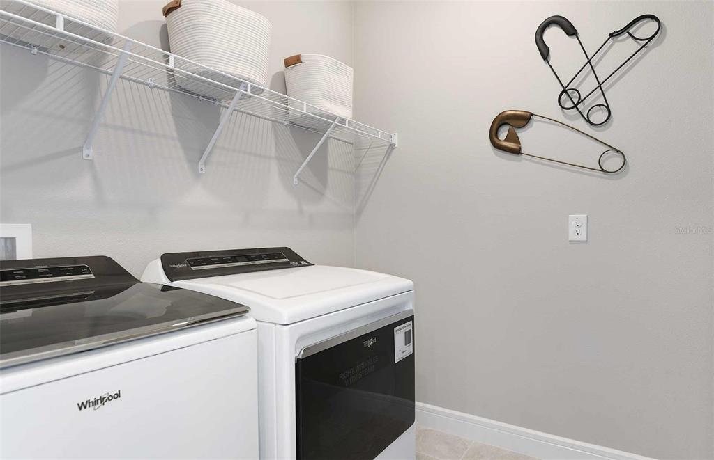 1730 Ruby Ln Lake Lake Alfred, FL 33850 - Photo 14 of 26 a utility room with dryer and washer