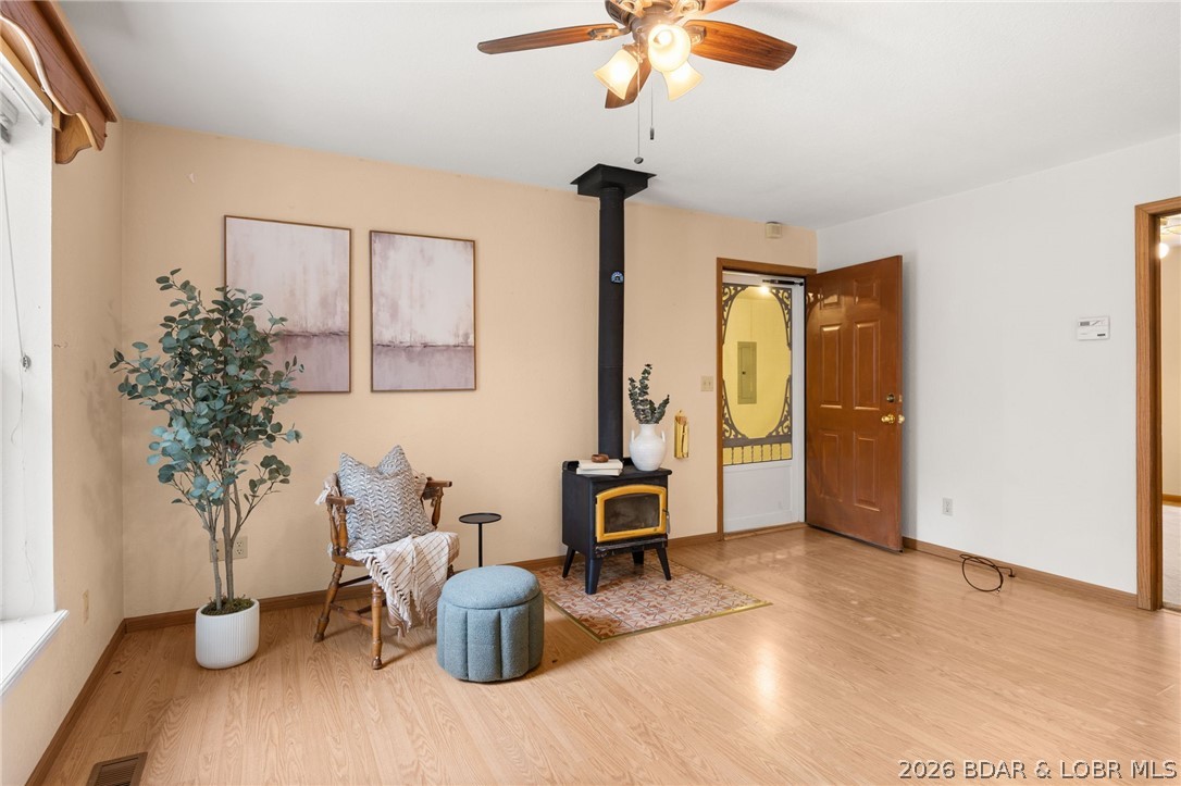 122 Hicks Drive Eldon, MO 65026 - Photo 7 of 51 Cozy living room with wood stove