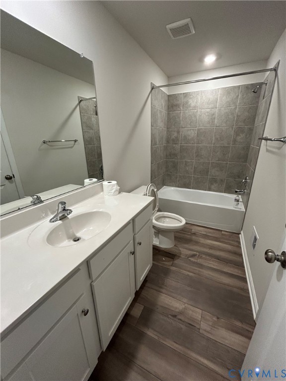 16040 Abelson Way, Unit 16040 Chesterfield, VA 23832 - Photo 12 of 20 a bathroom with a double vanity sink toilet mirror and shower