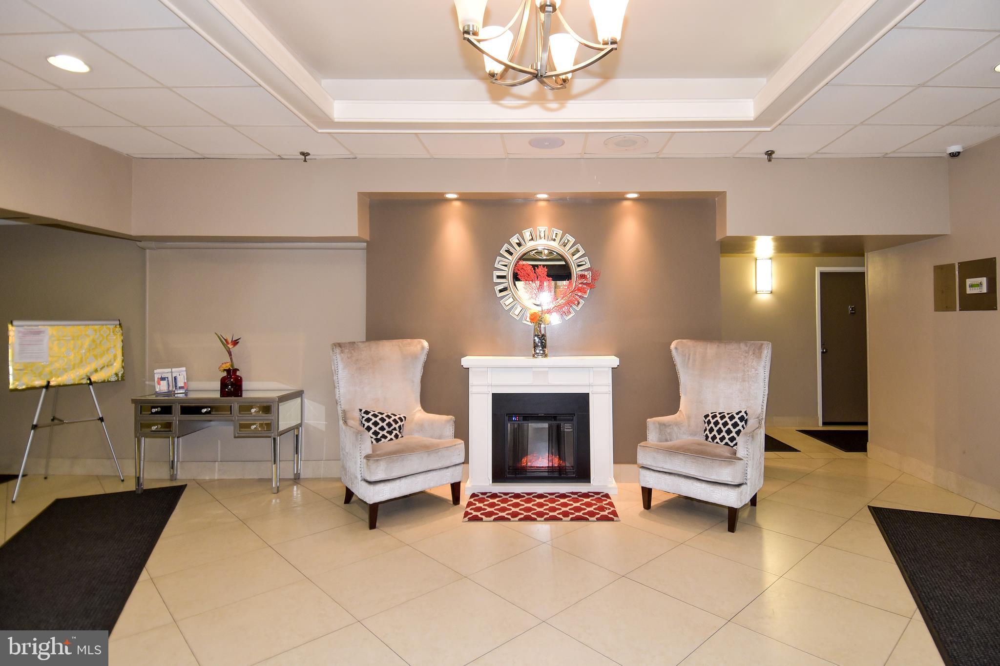 5911 Edsall Road, Unit 1010 Alexandria, VA 22304 - Photo 4 of 26 Cozy lobby ambiance