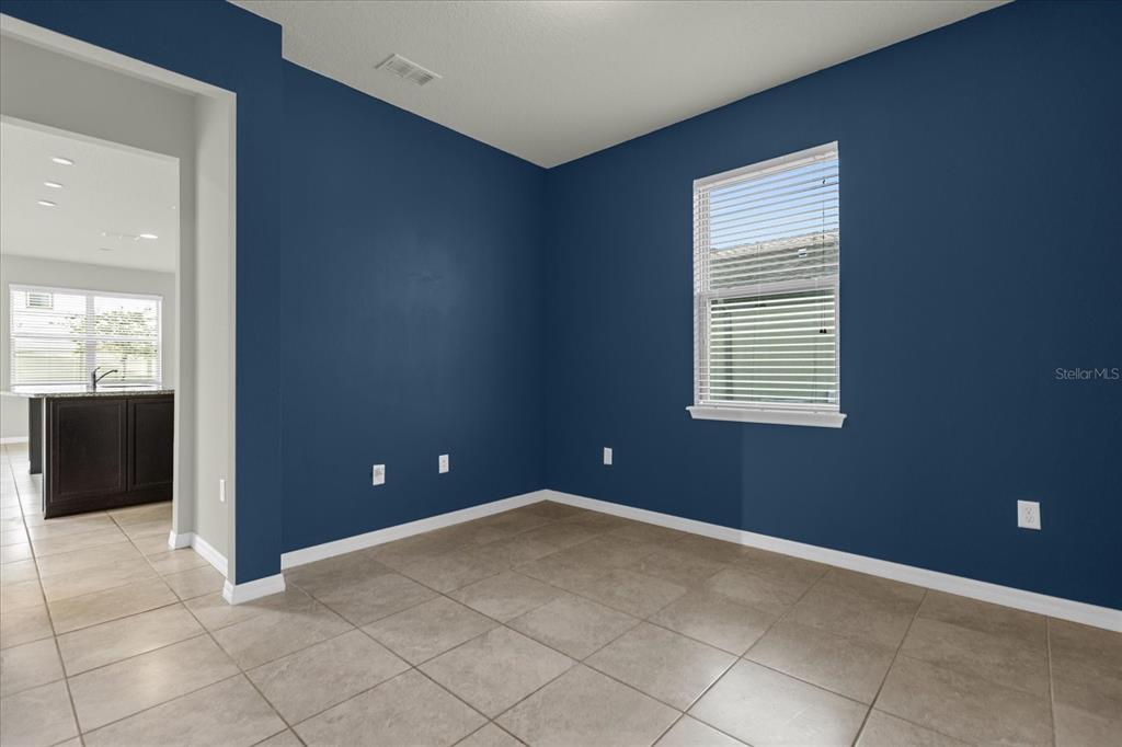 3504 Southern Cross Loop Kissimmee, FL 34744 - Photo 6 of 27 a view of an empty room with a window