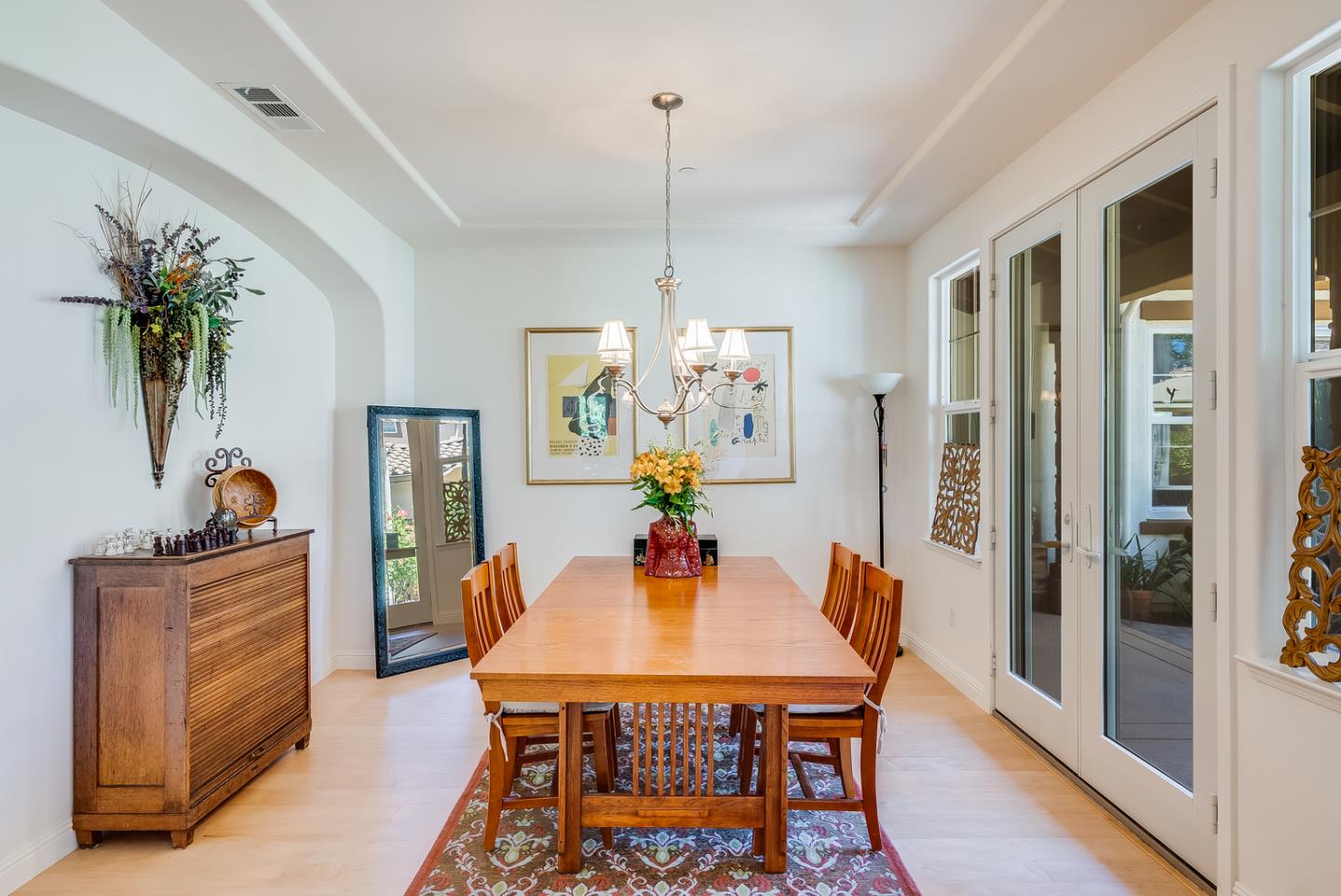 7680 MacKenzie Way Gilroy, CA 95020 - Photo 13 of 61 a view of a dining room with furniture window and wooden floor