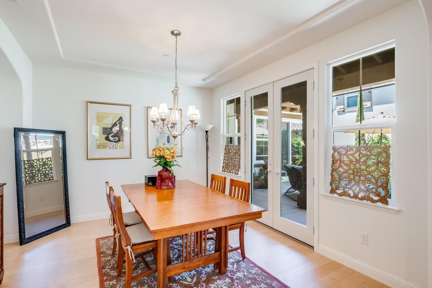 7680 MacKenzie Way Gilroy, CA 95020 - Photo 15 of 61 a view of a dining room with furniture window and wooden floor