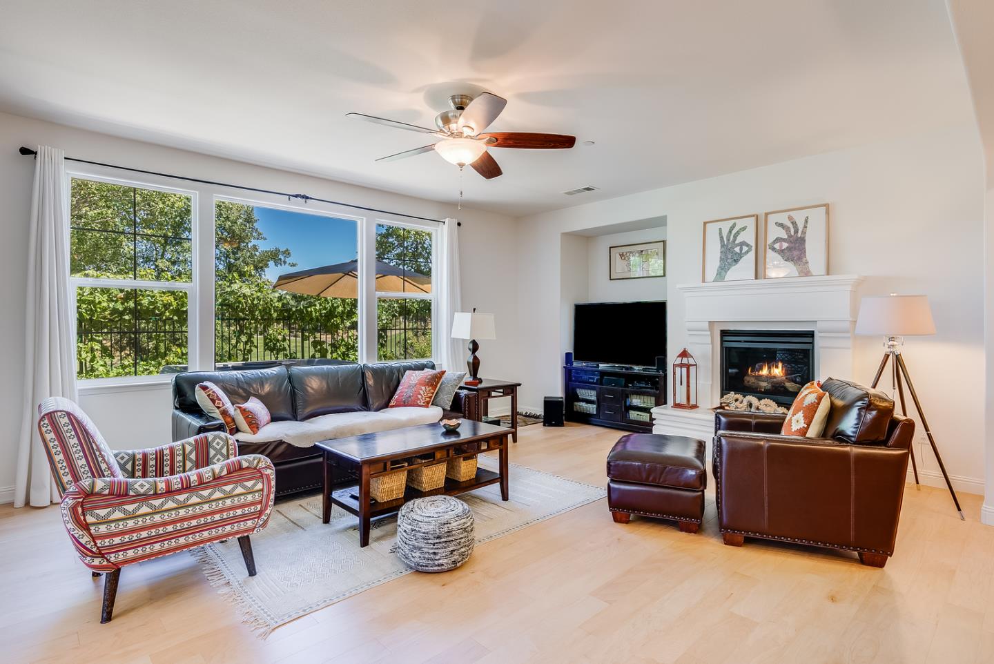 7680 MacKenzie Way Gilroy, CA 95020 - Photo 23 of 61 a living room with furniture large window and a fireplace