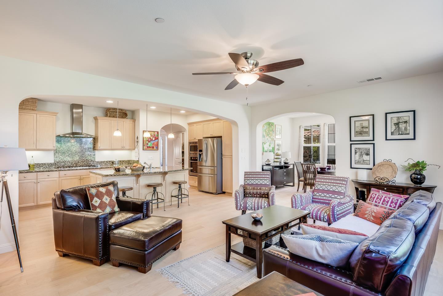 7680 MacKenzie Way Gilroy, CA 95020 - Photo 24 of 61 a living room with furniture kitchen view and a chandelier