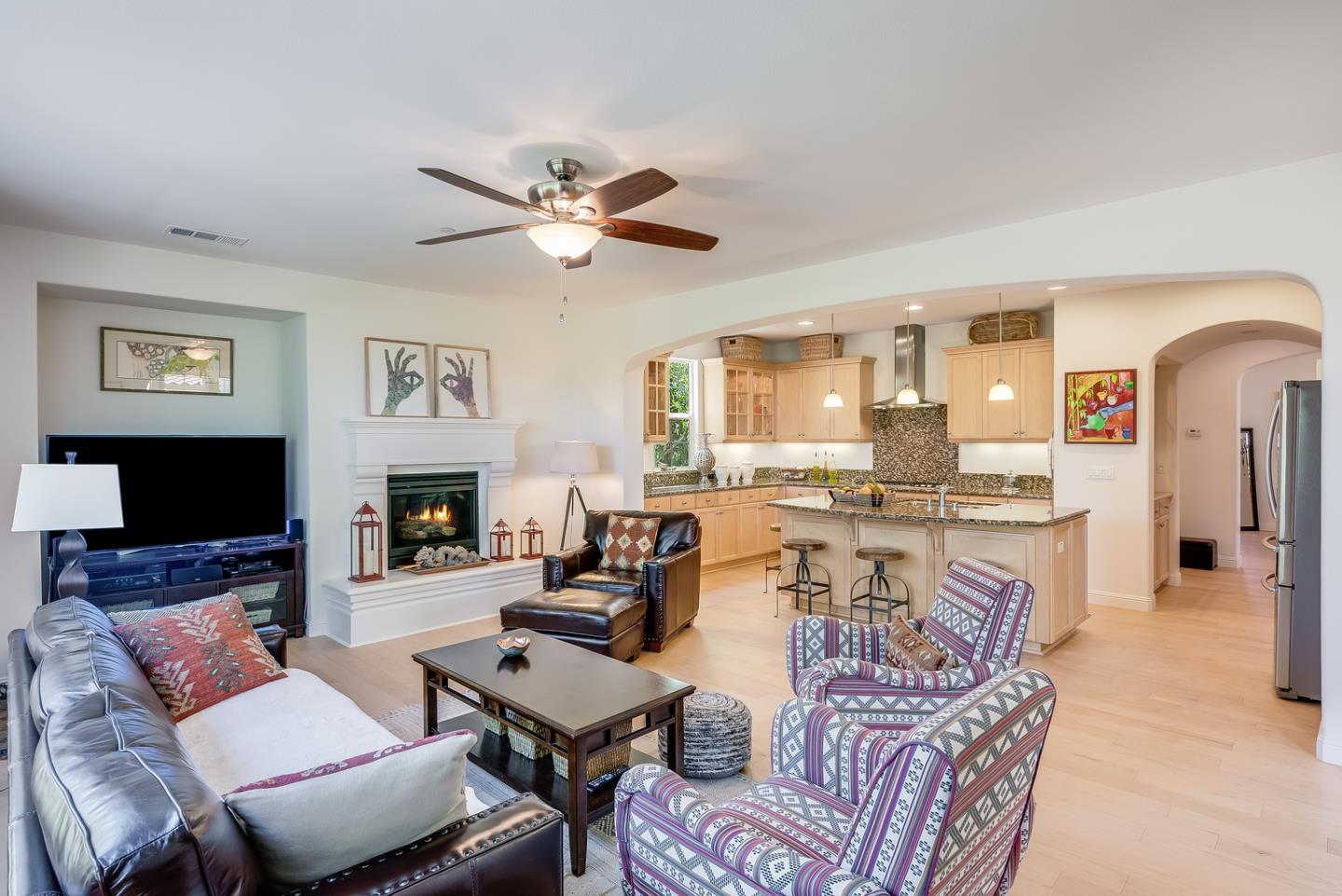 7680 MacKenzie Way Gilroy, CA 95020 - Photo 26 of 61 a living room with fireplace furniture and a flat screen tv