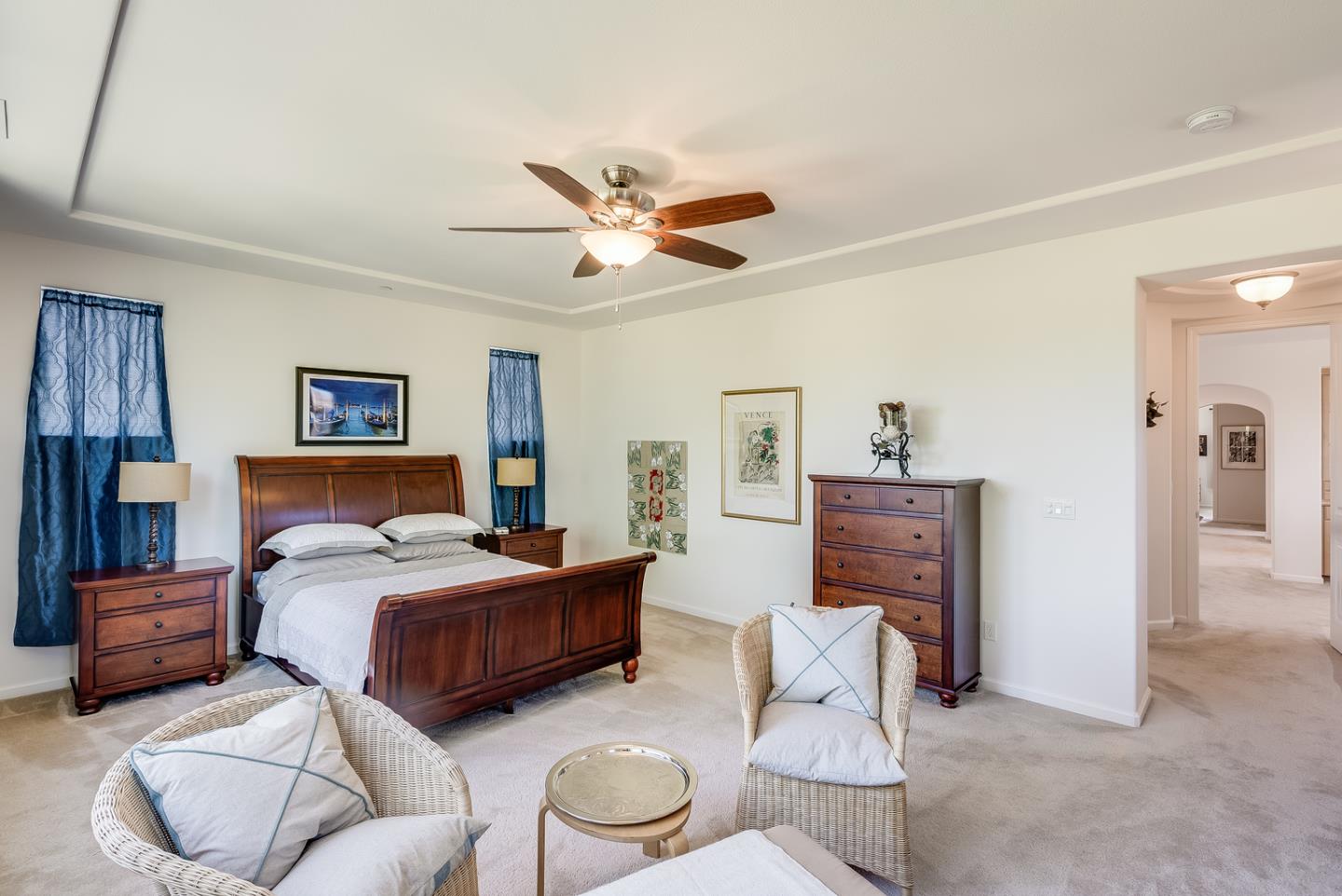 7680 MacKenzie Way Gilroy, CA 95020 - Photo 32 of 61 a bedroom with a bed and furniture