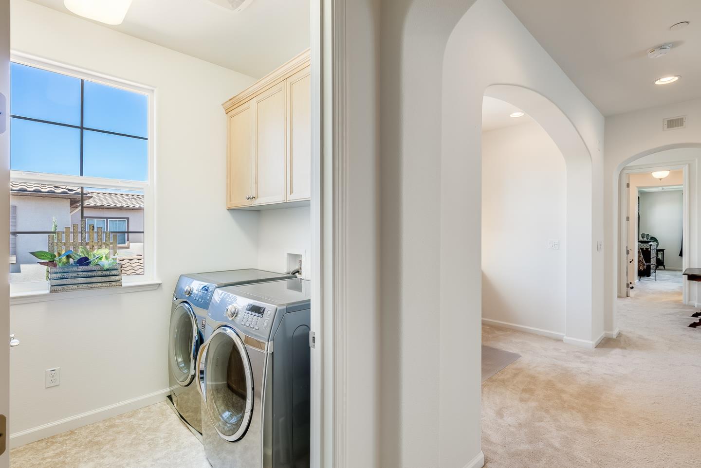 7680 MacKenzie Way Gilroy, CA 95020 - Photo 42 of 61 a view of a storage & utility room with washer and dryer