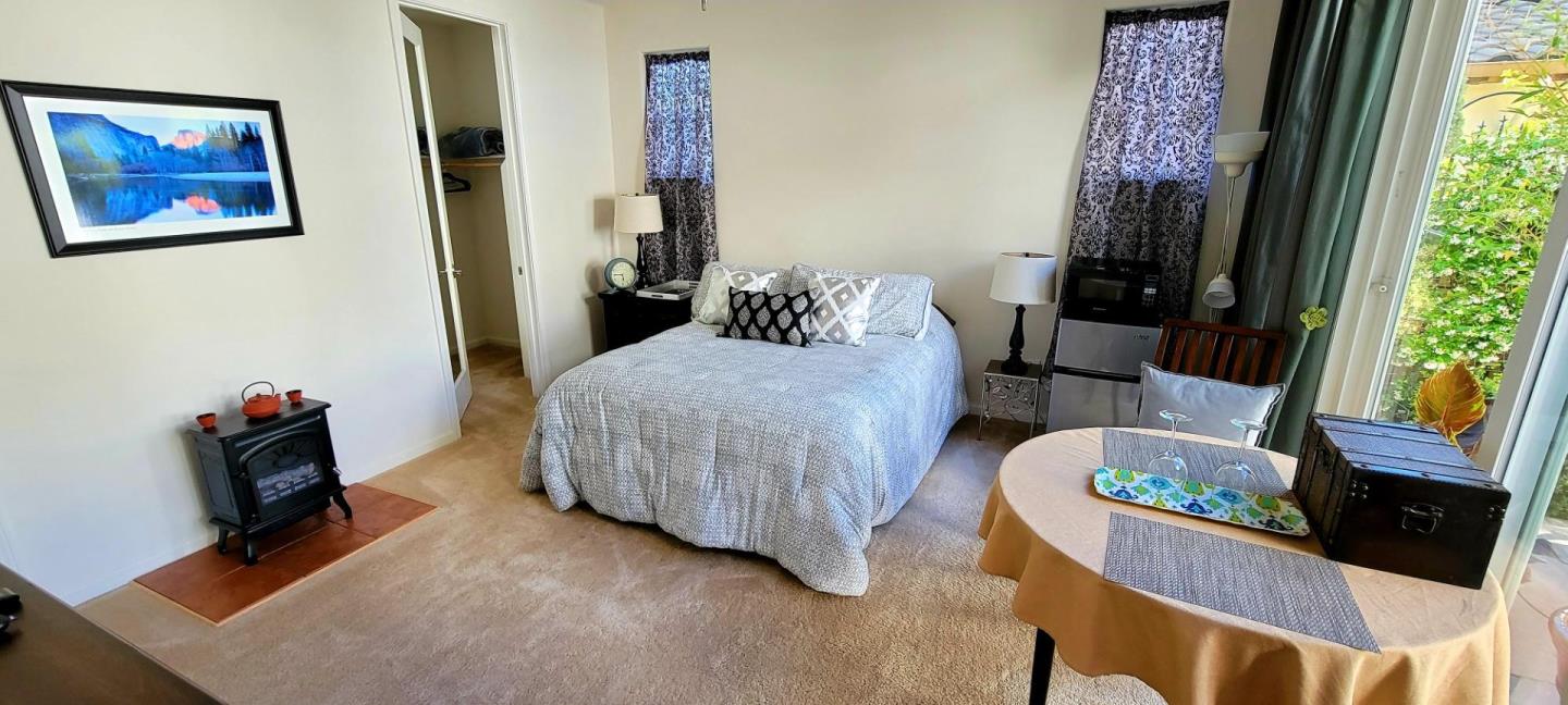 7680 MacKenzie Way Gilroy, CA 95020 - Photo 46 of 61 a bedroom with furniture and a window