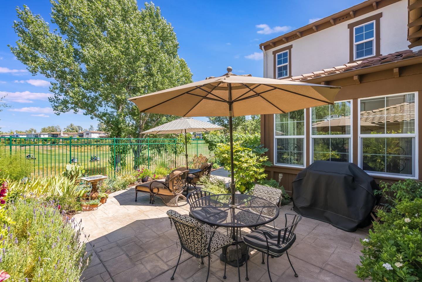 7680 MacKenzie Way Gilroy, CA 95020 - Photo 49 of 61 a view of a house with backyard sitting area and garden