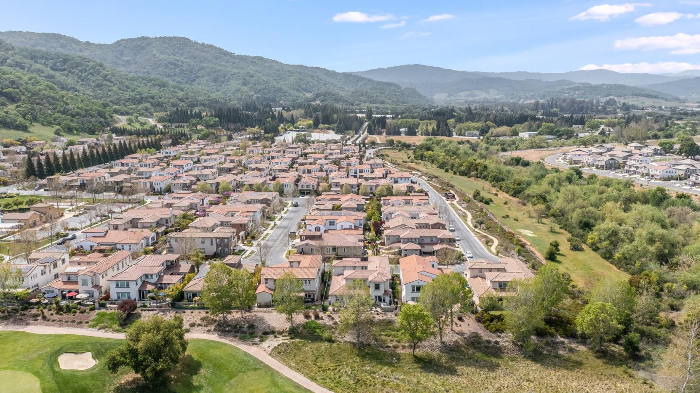 7680 MacKenzie Way Gilroy, CA 95020 - Photo 54 of 61 an aerial view of residential houses with outdoor space and trees