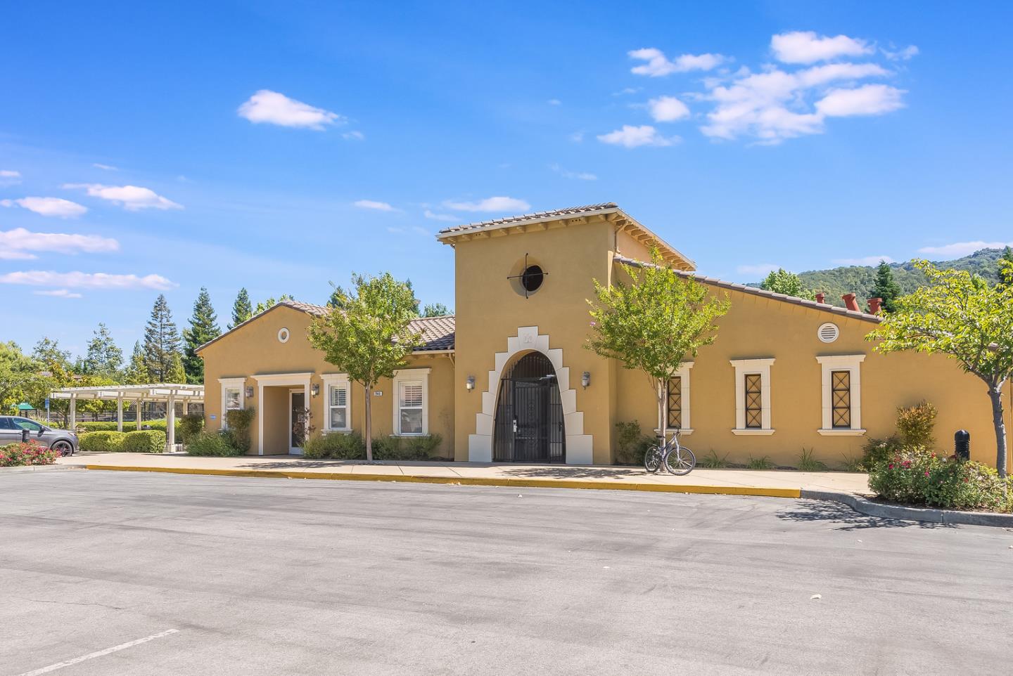7680 MacKenzie Way Gilroy, CA 95020 - Photo 57 of 61 a front view of a house with a yard
