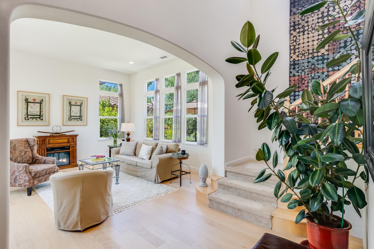 7680 MacKenzie Way Gilroy, CA 95020 - Photo 8 of 61 a living room with furniture and a potted plant