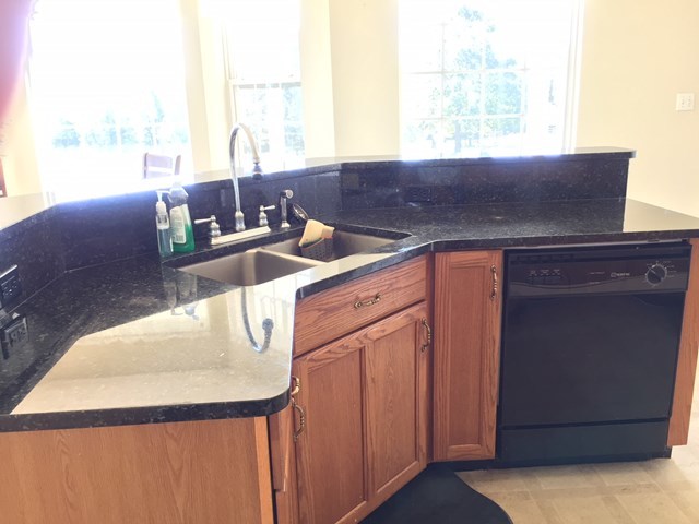 409 Torbet Road, Unit 1A1 Forsyth, GA 31029 - Photo 13 of 29 a kitchen with a sink and a window