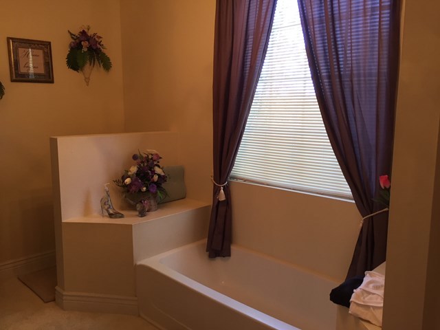 409 Torbet Road, Unit 1A1 Forsyth, GA 31029 - Photo 8 of 29 a bathroom with a sink and mirror