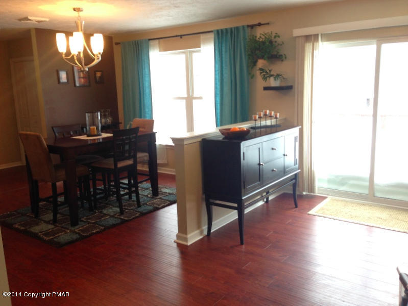 1148 Sunside Road Long Pond, PA 18334 - Photo 4 of 20 a living room with furniture and a large window