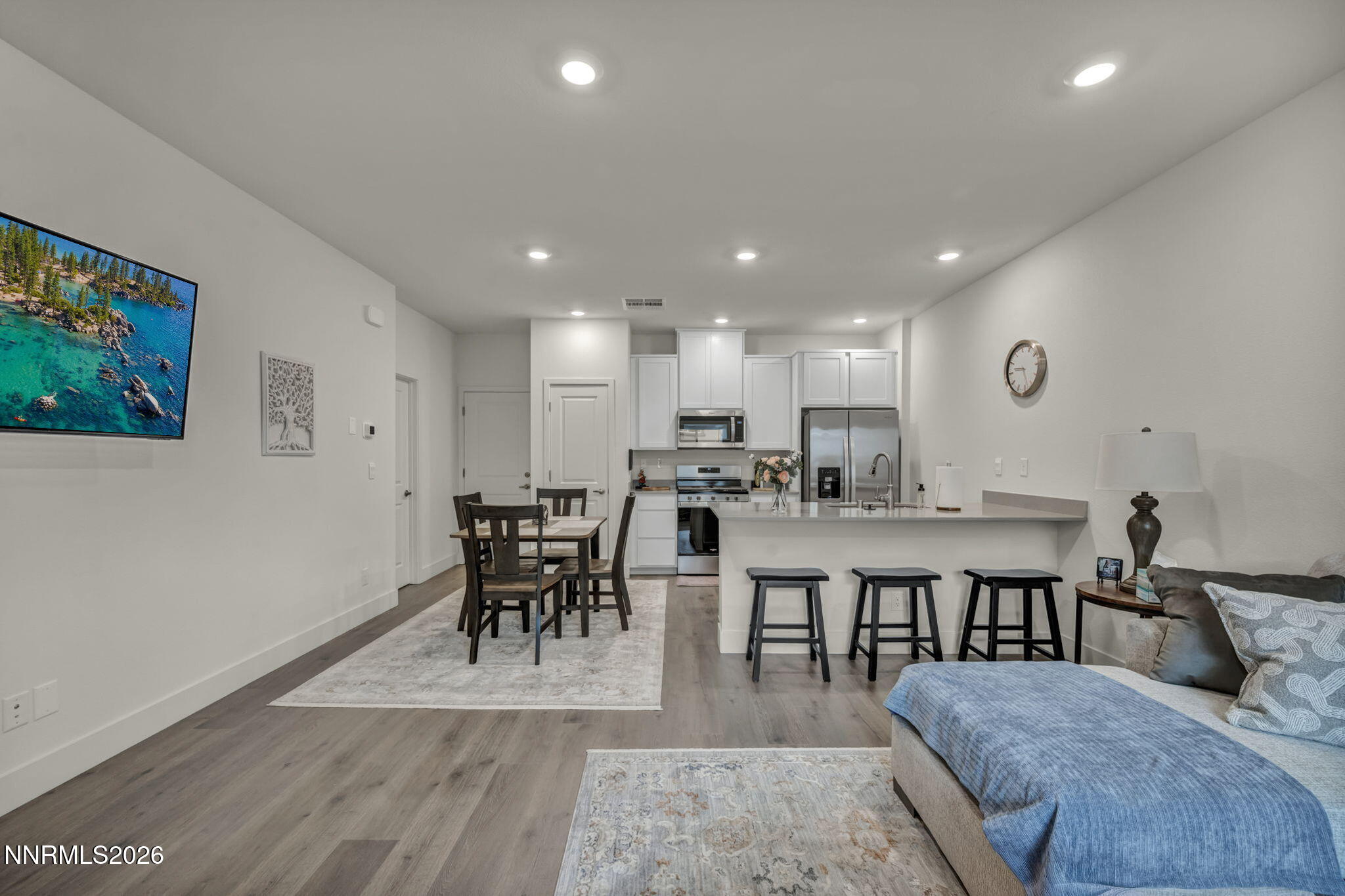 1634 Icelandic Way Reno, NV 89523 - Photo 12 of 49 a living room with lots of furniture and a wooden floor