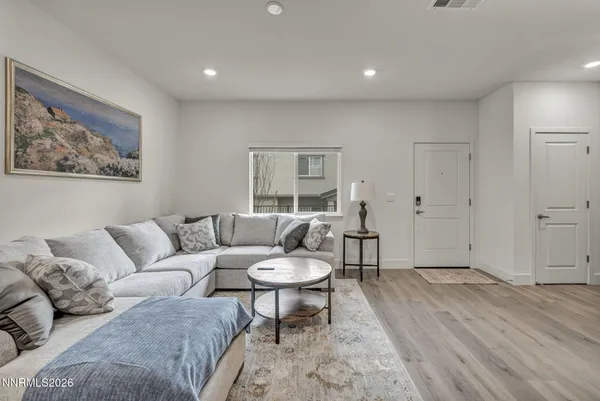 a living room with furniture and a couch