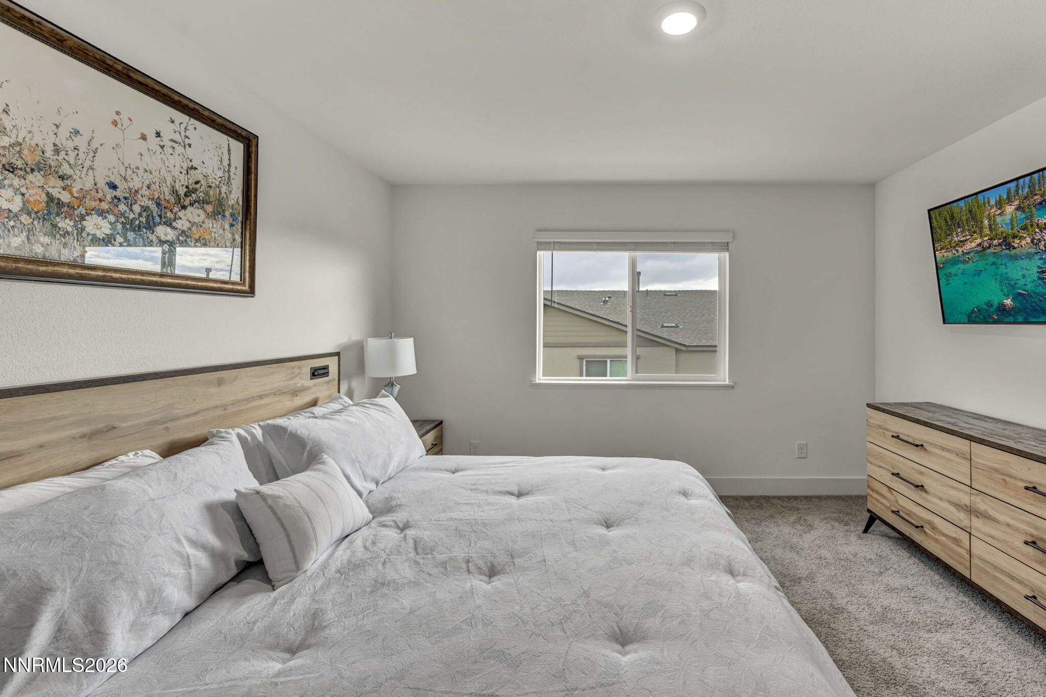 1634 Icelandic Way Reno, NV 89523 - Photo 18 of 49 a bedroom with a bed and a flat screen tv