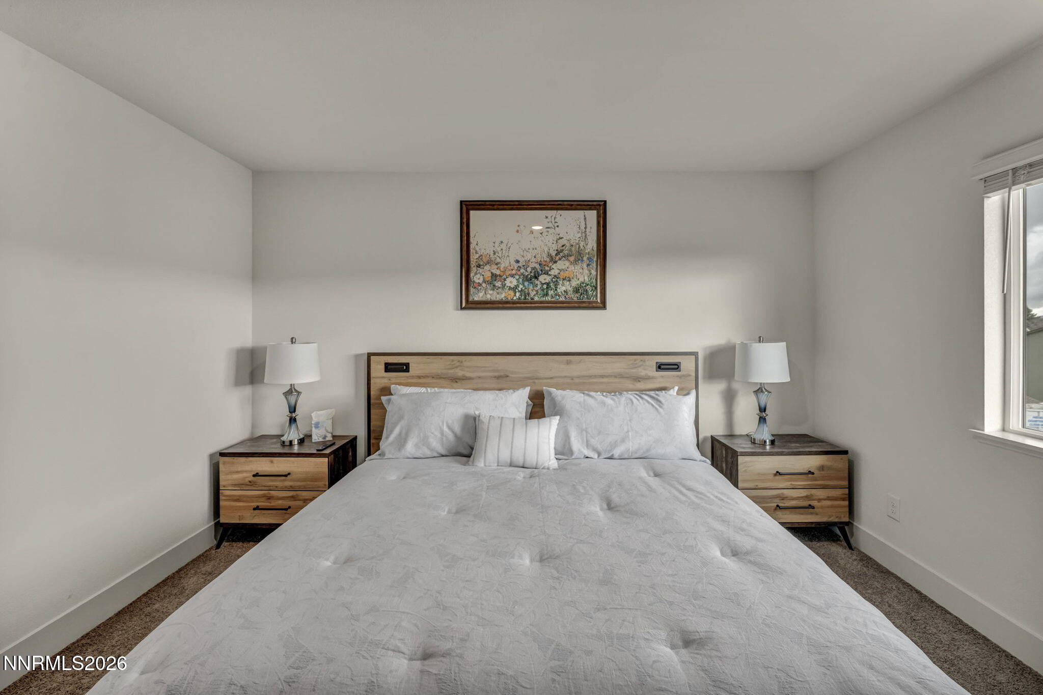 1634 Icelandic Way Reno, NV 89523 - Photo 20 of 49 a bedroom with a bed and a painting on the wall