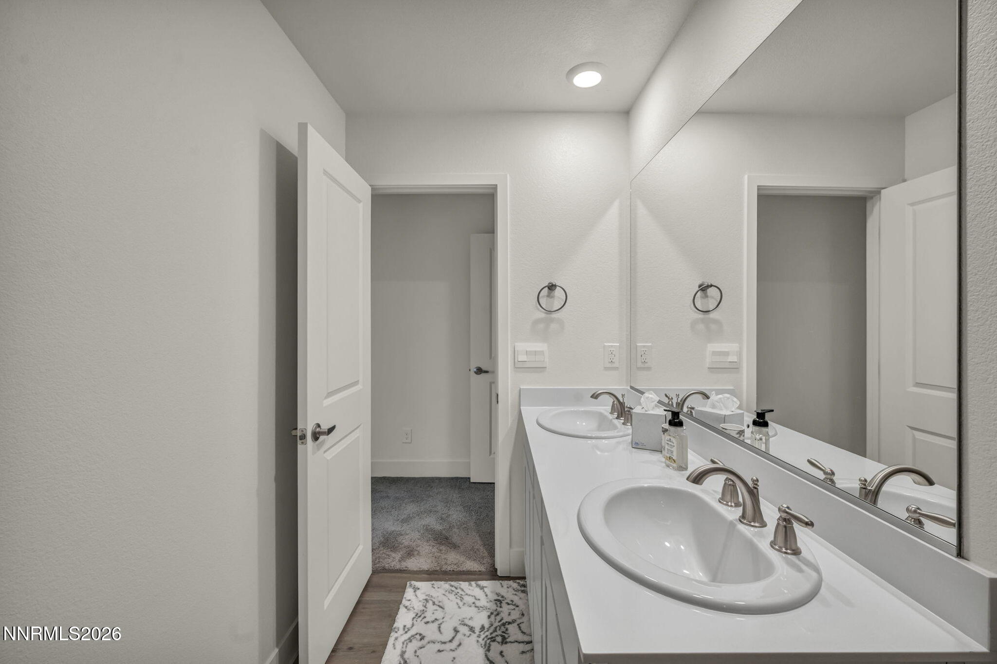 1634 Icelandic Way Reno, NV 89523 - Photo 23 of 49 a bathroom with a sink and a mirror