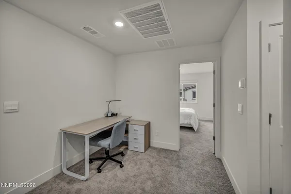 a view of a hallway view with staircase