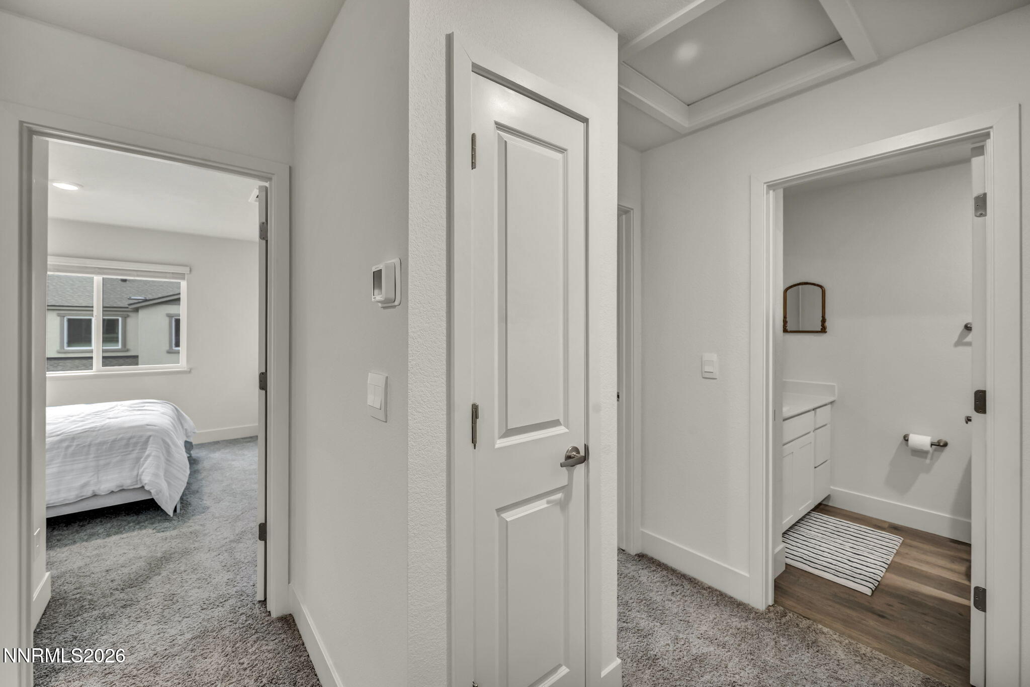 1634 Icelandic Way Reno, NV 89523 - Photo 30 of 49 a view of a bedroom with a bed and wooden floor