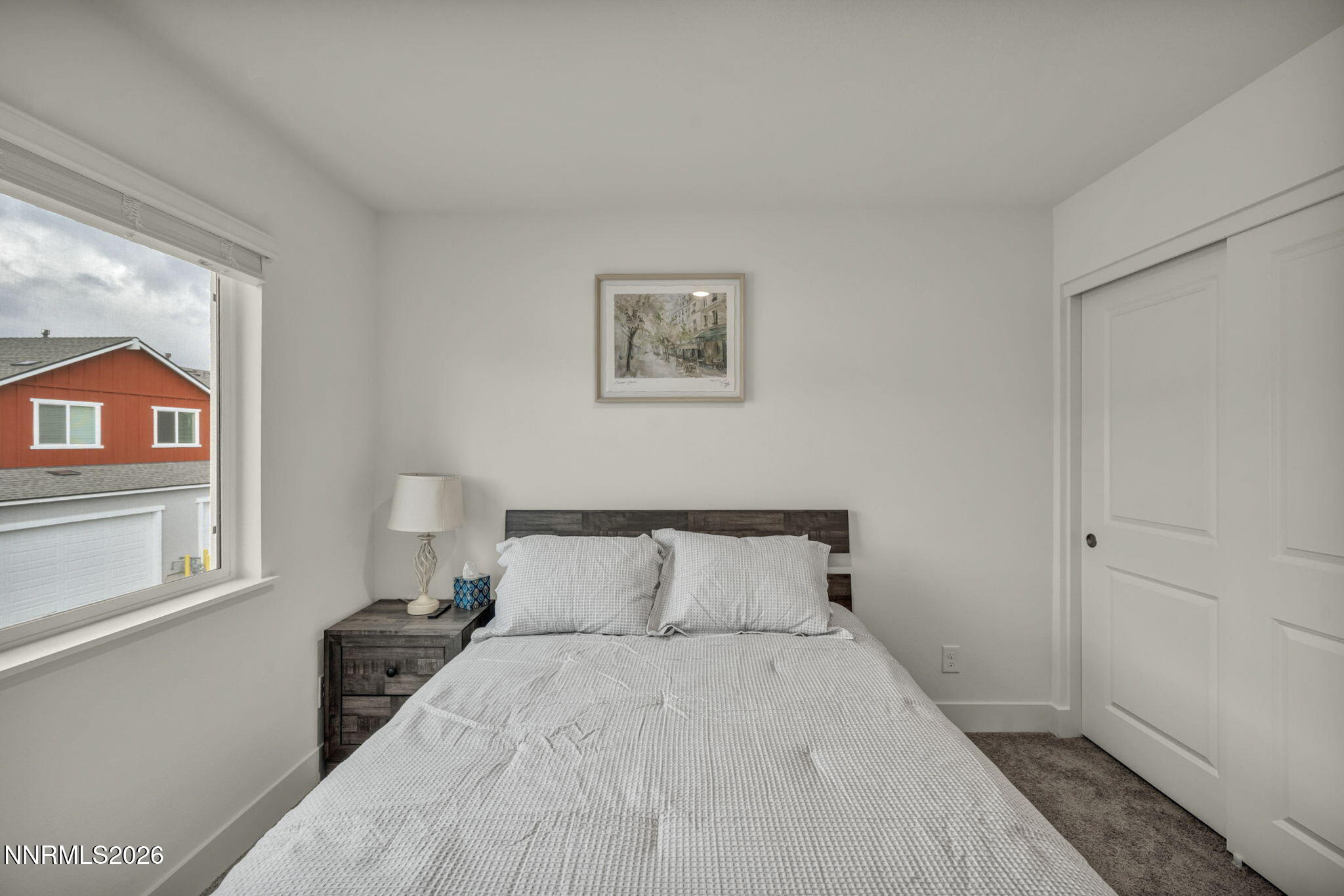 1634 Icelandic Way Reno, NV 89523 - Photo 32 of 49 a bedroom with a bed and a window