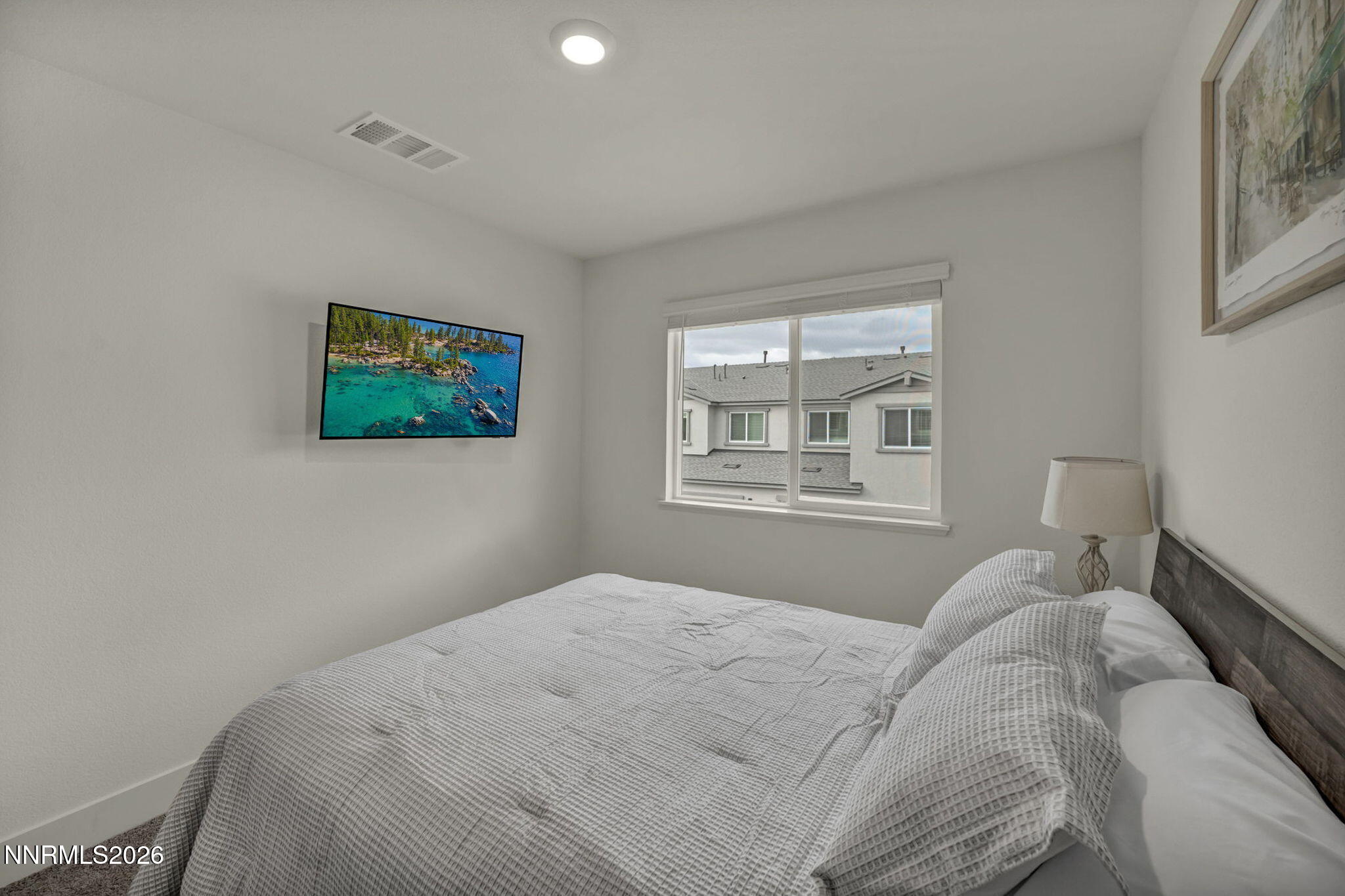 1634 Icelandic Way Reno, NV 89523 - Photo 33 of 49 a bedroom with a bed and a window