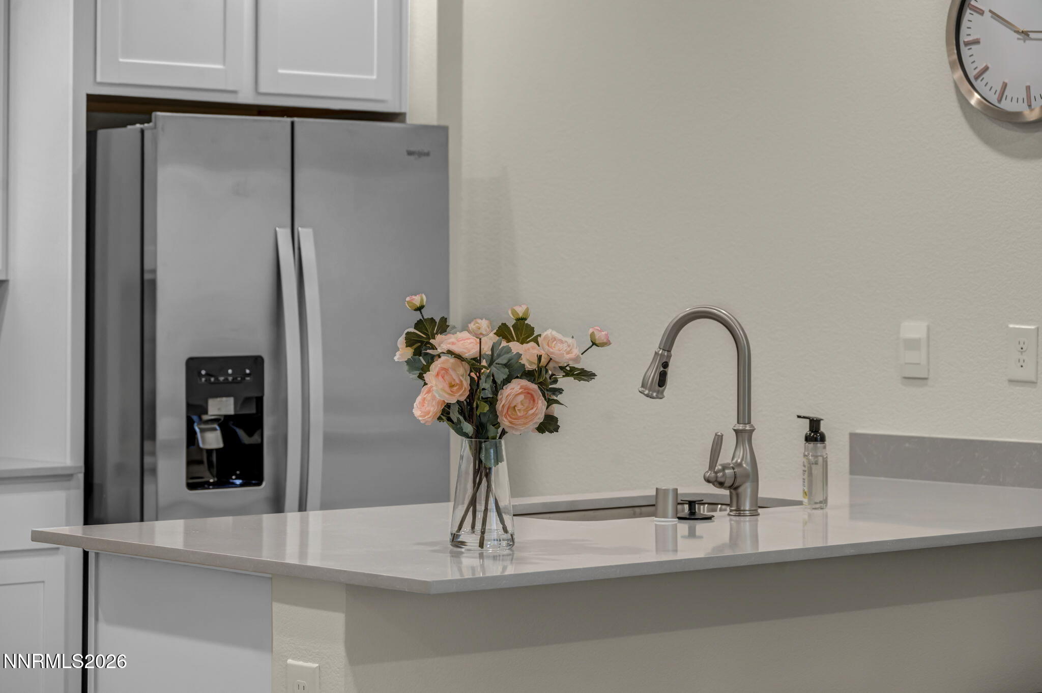 1634 Icelandic Way Reno, NV 89523 - Photo 7 of 49 a closeup of a sink with a potted plant on it