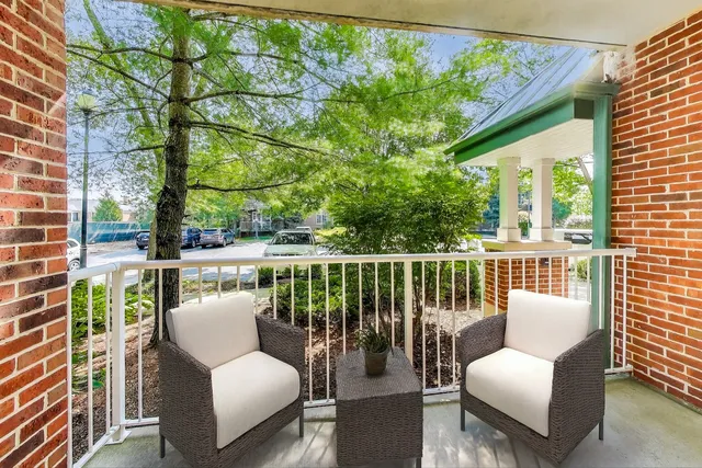 a bedroom with bed and a night stand