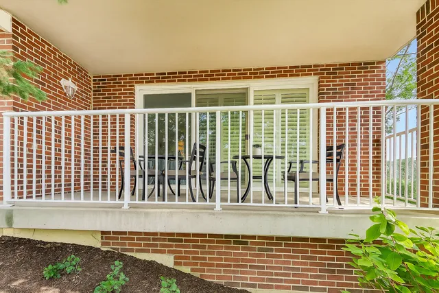 a picture of a room with a white wall and a picture of a painting