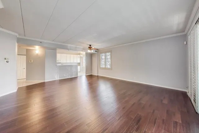 a kitchen with a sink a stove and refrigerator