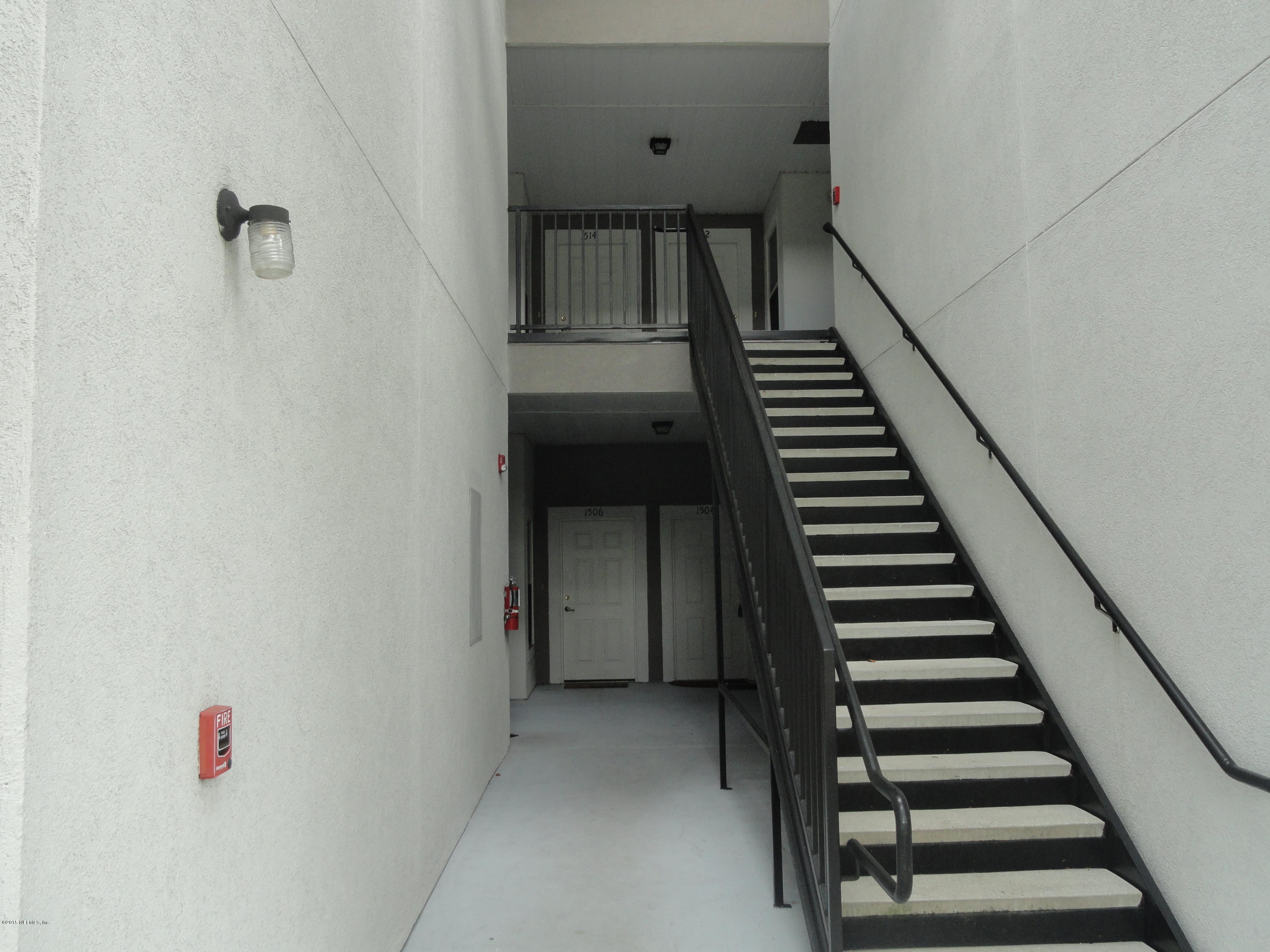 7920 Merrill Road, Unit 1505 Jacksonville, FL 32277 - Photo 3 of 19 a view of an entryway with wooden floor