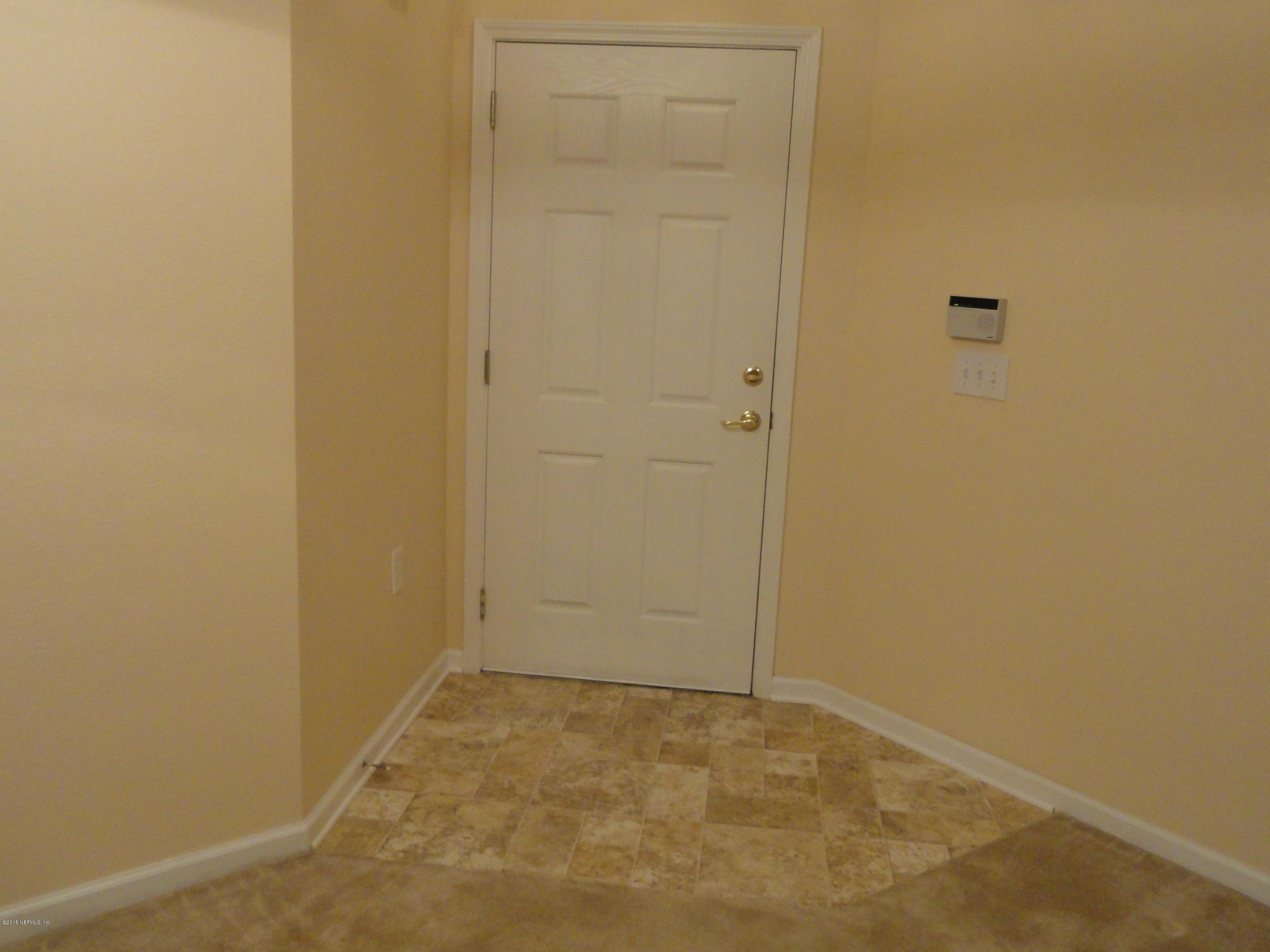 7920 Merrill Road, Unit 1505 Jacksonville, FL 32277 - Photo 6 of 19 an empty room