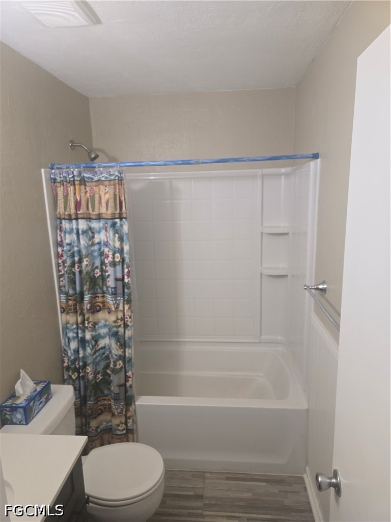 8093 Anhinga Road Fort Myers, FL 33967 - Photo 27 of 49 a bathroom with a toilet and a bathtub
