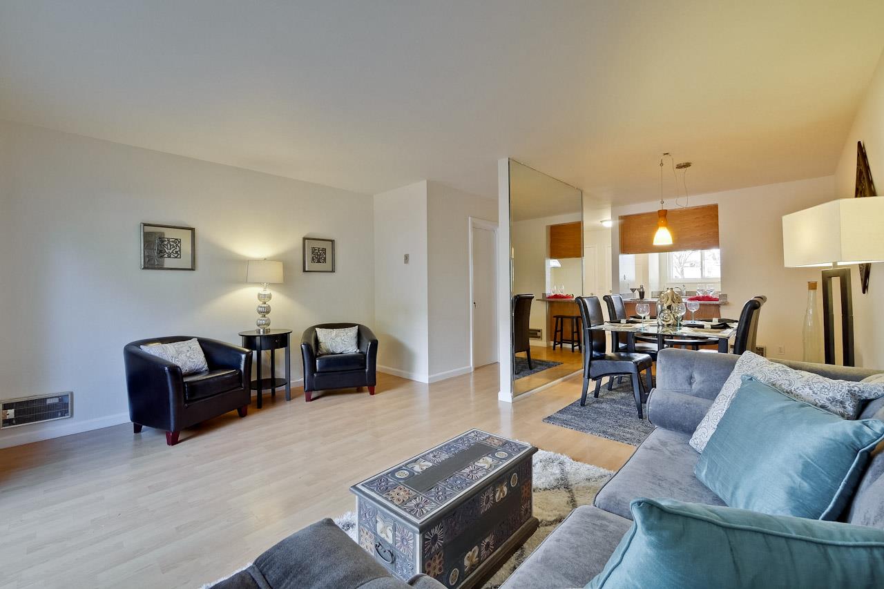 1133 Reed Avenue, Unit B Sunnyvale, CA 94086 - Photo 11 of 33 a living room with furniture and a wooden floor