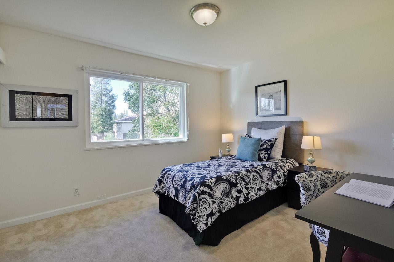 1133 Reed Avenue, Unit B Sunnyvale, CA 94086 - Photo 13 of 33 a bedroom with a bed and a window