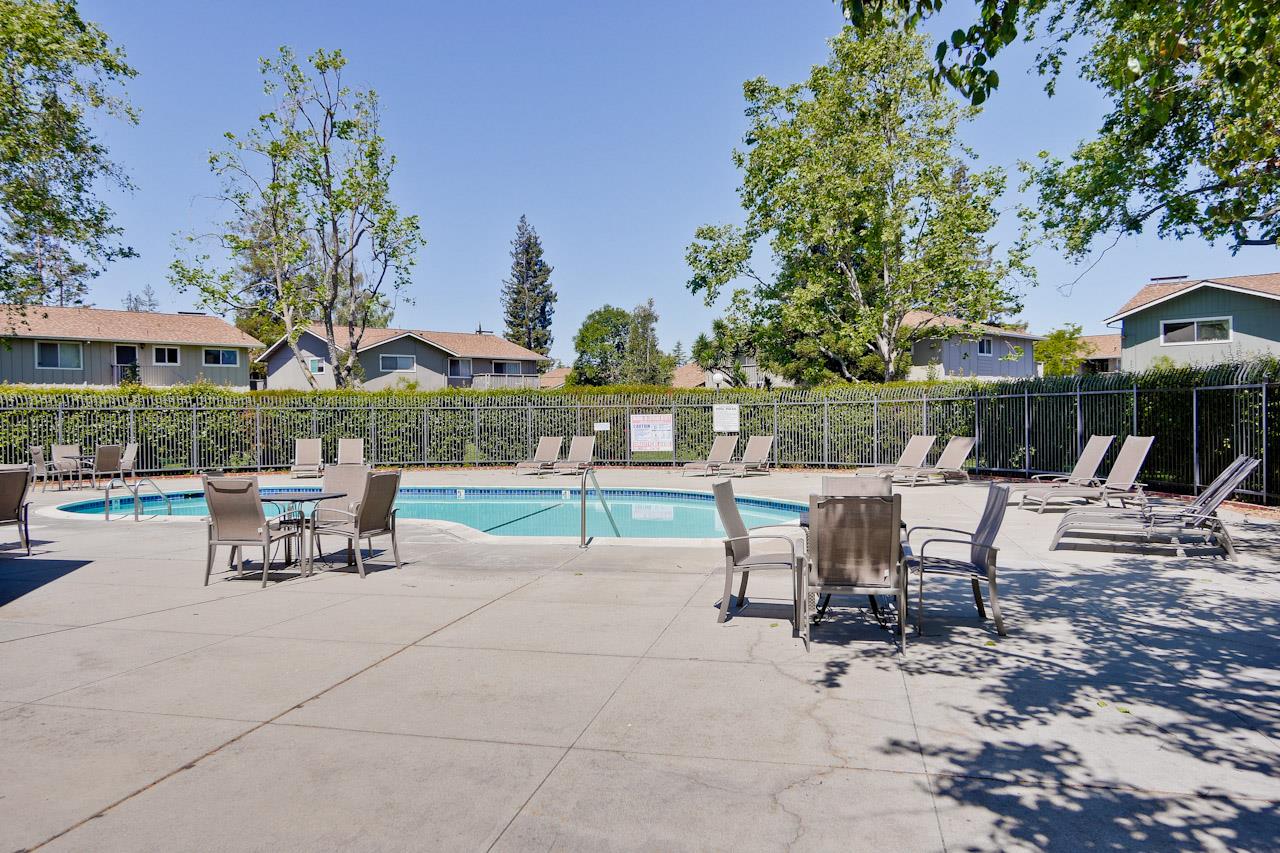 1133 Reed Avenue, Unit B Sunnyvale, CA 94086 - Photo 24 of 33 a view of a patio with a table and chairs