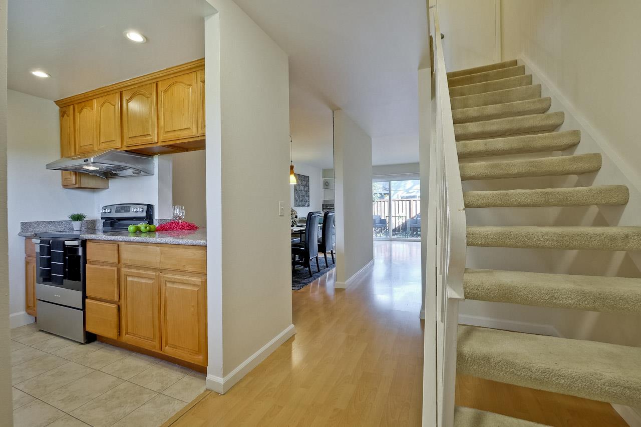 1133 Reed Avenue, Unit B Sunnyvale, CA 94086 - Photo 3 of 33 a view of a kitchen from the hallway