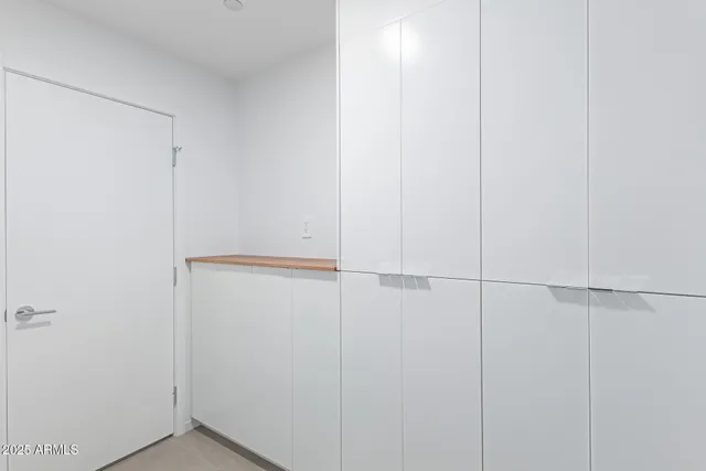 a bathroom with a sink and mirror