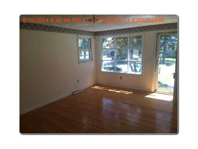 27 Burnside Street Warwick, RI 02886 - Photo 5 of 13 Living Room.