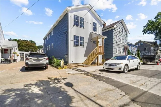 a view of a street with cars