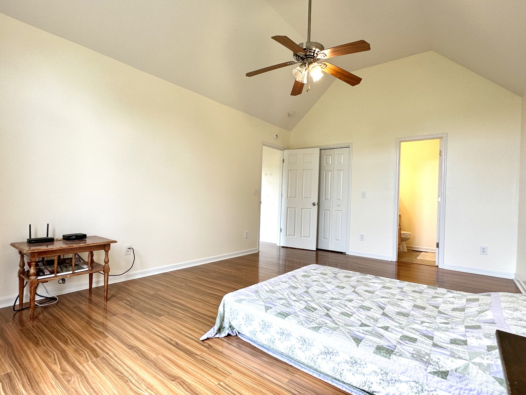 26 Ridgeline Drive Fayetteville, TN 37334 - Photo 18 of 39 a bedroom with a bed and a chandelier