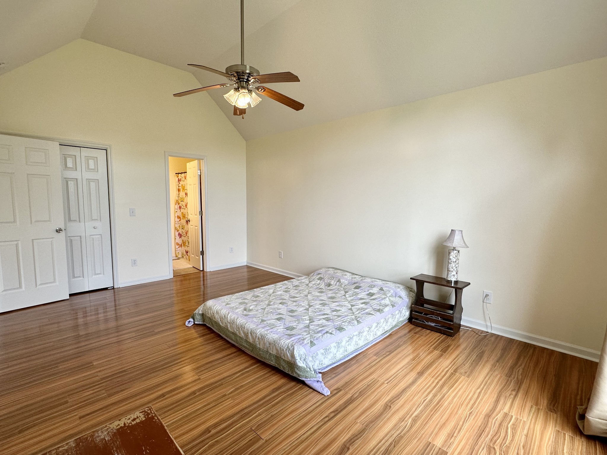 26 Ridgeline Drive Fayetteville, TN 37334 - Photo 19 of 39 a bedroom with a bed and wooden floor