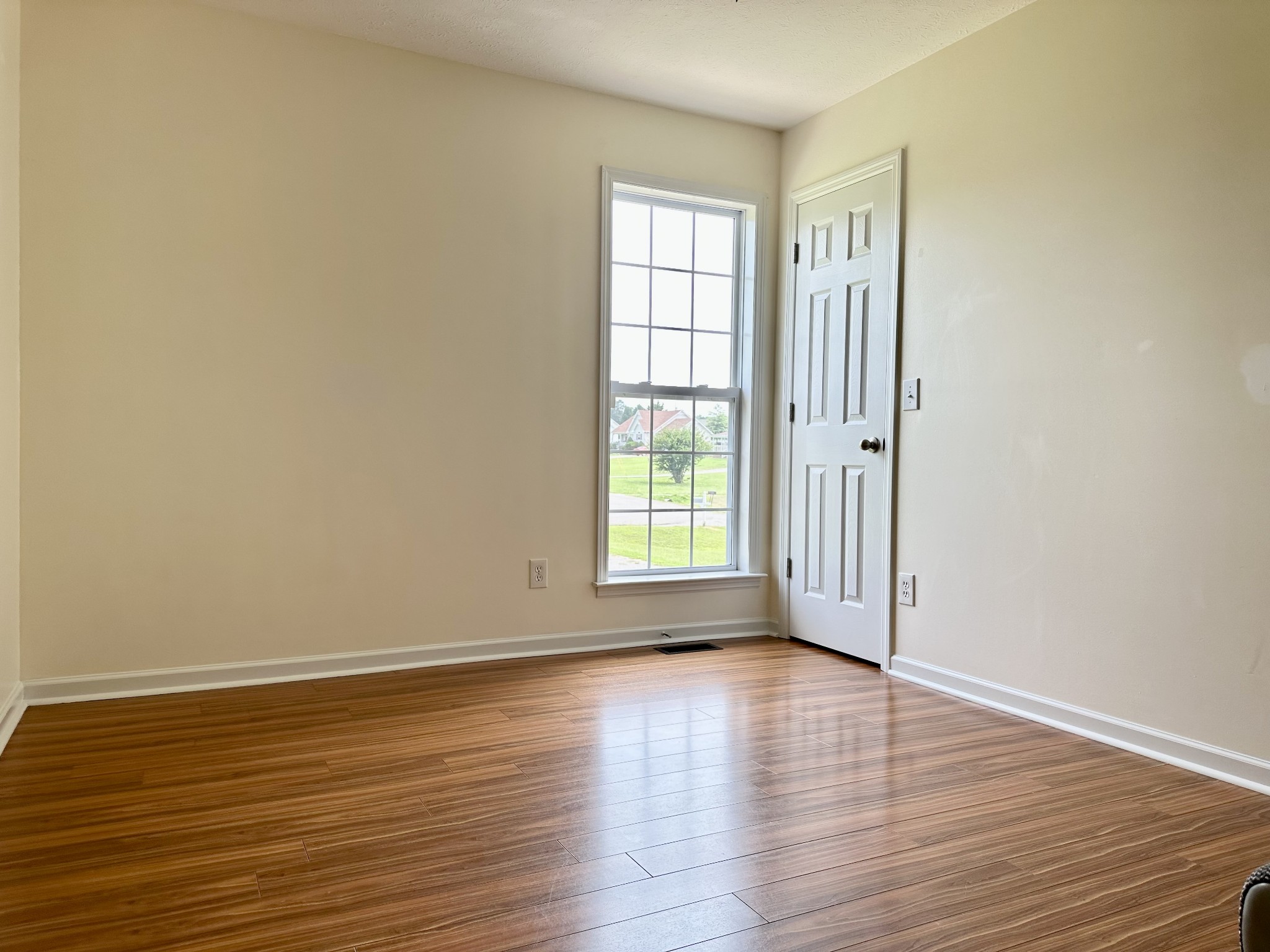 26 Ridgeline Drive Fayetteville, TN 37334 - Photo 23 of 39 a view of an empty room with wooden floor and a window