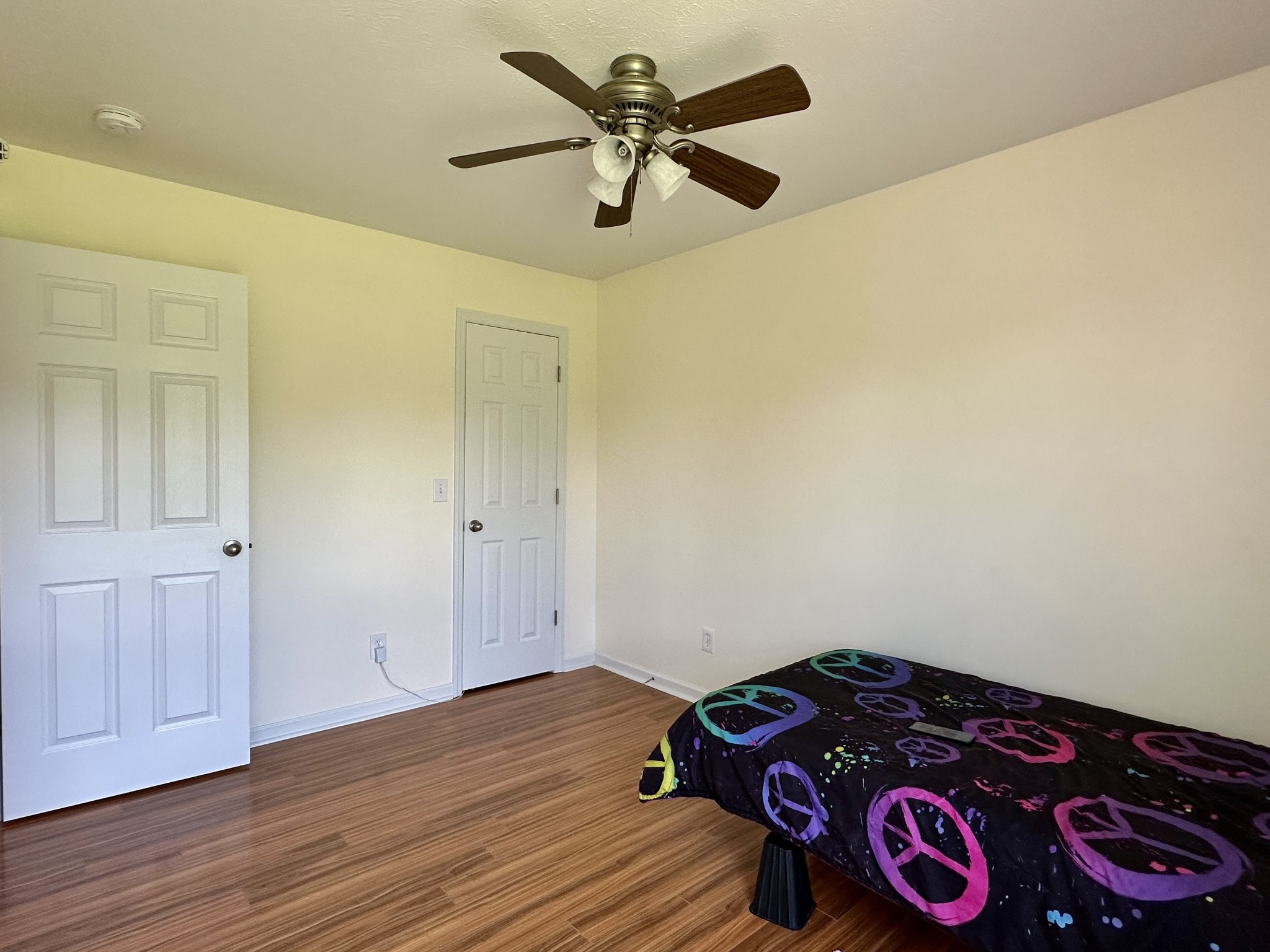 26 Ridgeline Drive Fayetteville, TN 37334 - Photo 26 of 39 a bedroom with a bed and a chandelier