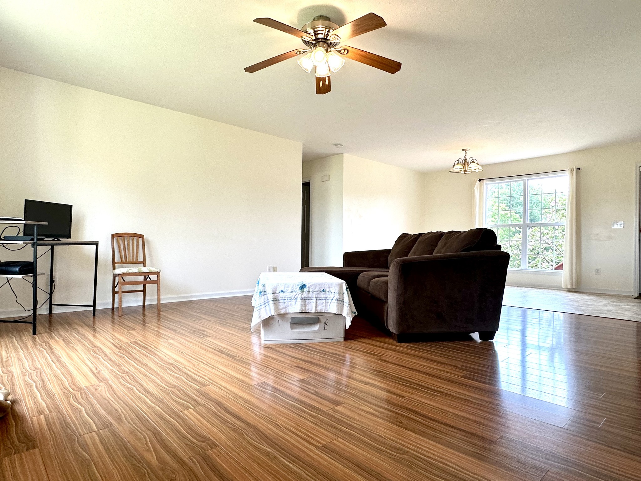 26 Ridgeline Drive Fayetteville, TN 37334 - Photo 6 of 39 a living room with couches and a coffee table with wooden floor