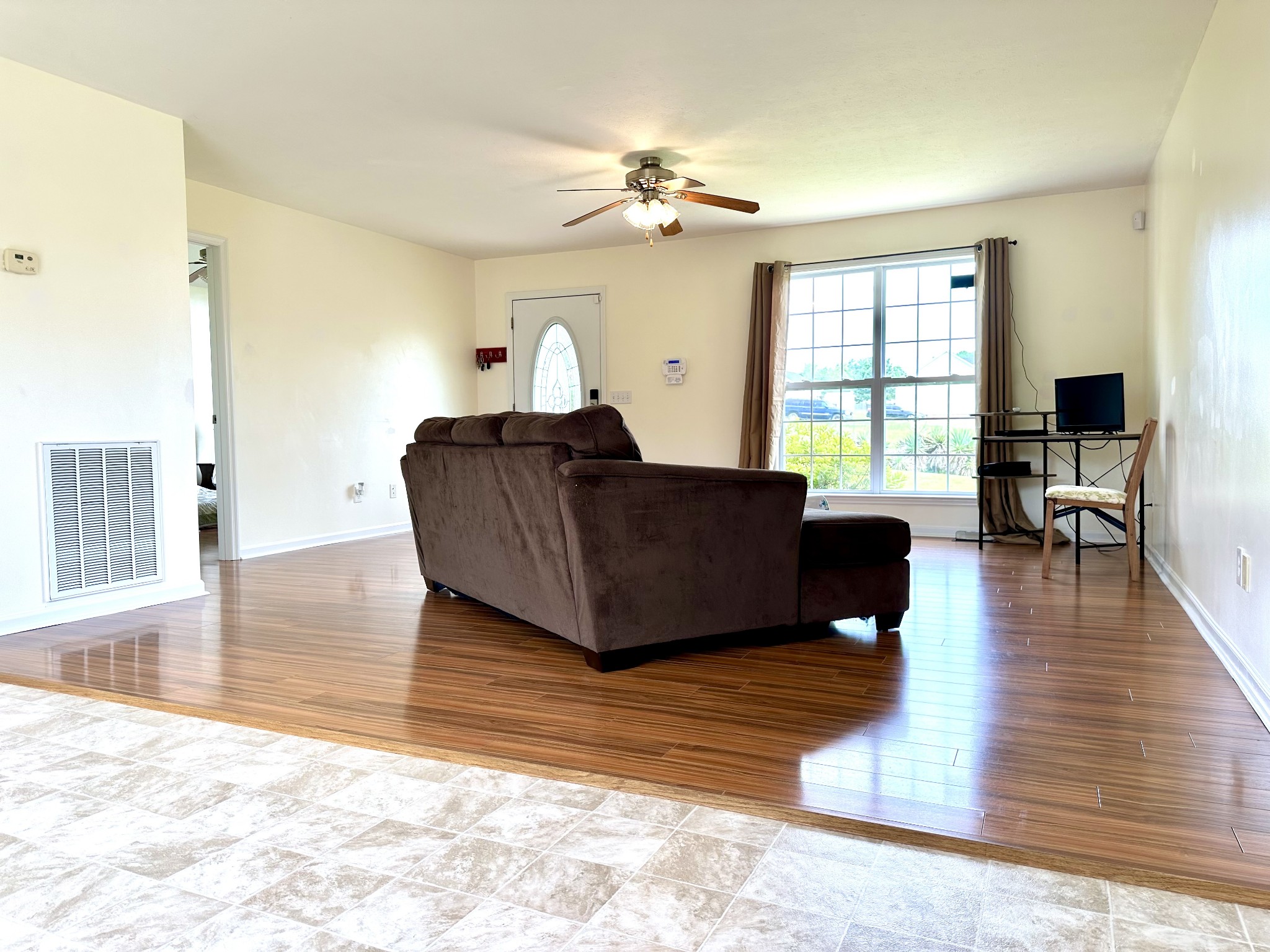 26 Ridgeline Drive Fayetteville, TN 37334 - Photo 7 of 39 a living room with furniture and a wooden floor